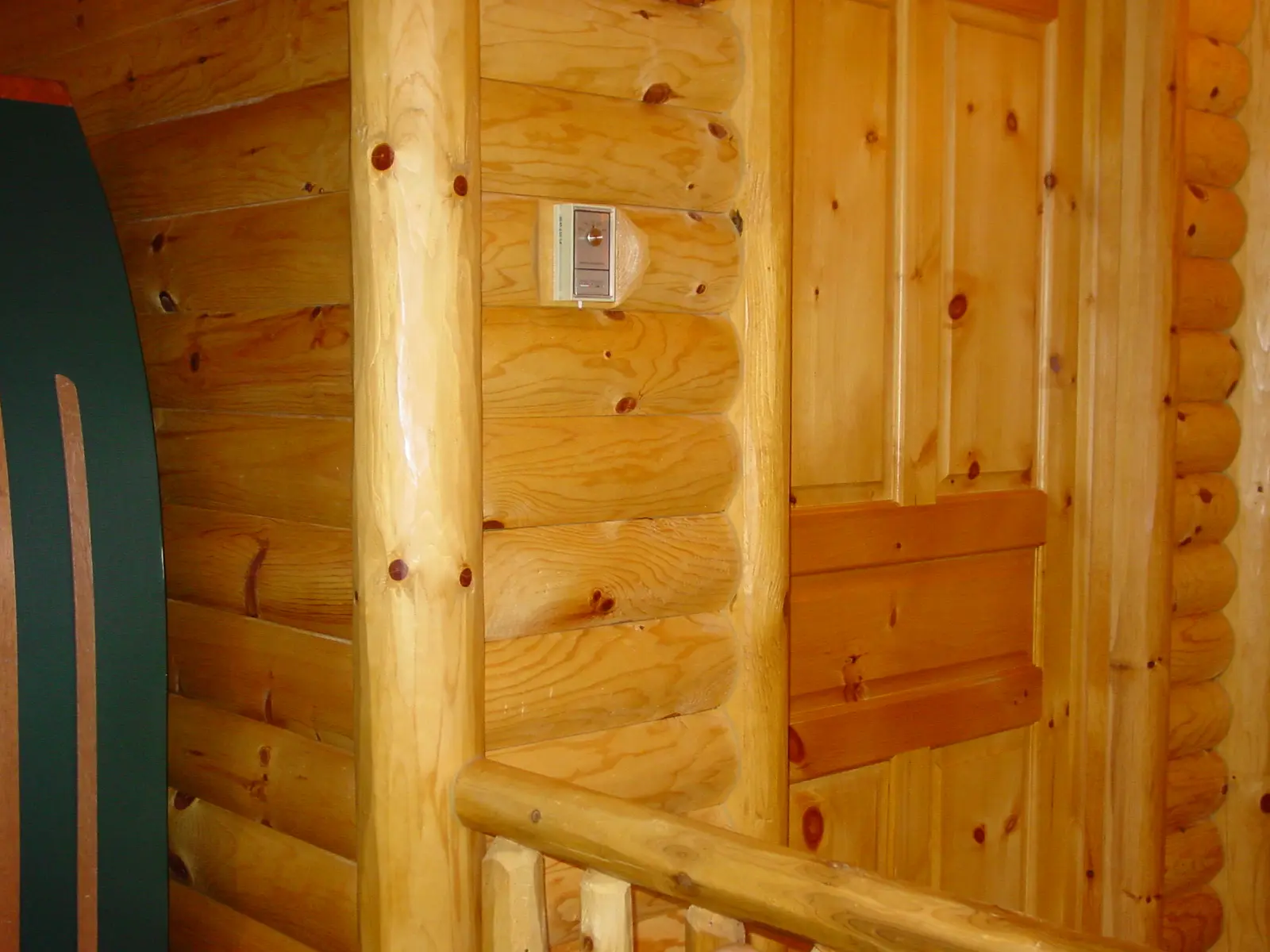 Hand-hewn half log siding
